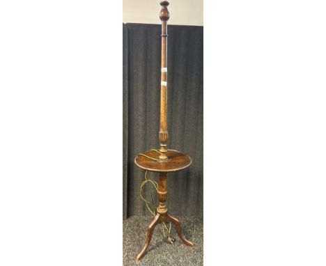 19th century oak standard lamp raised on a tripod base 