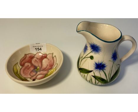 Moorcroft Pink Magnolia on cream ground small bowl together with a Griselda Hill pottery Wemyss decorative jug 