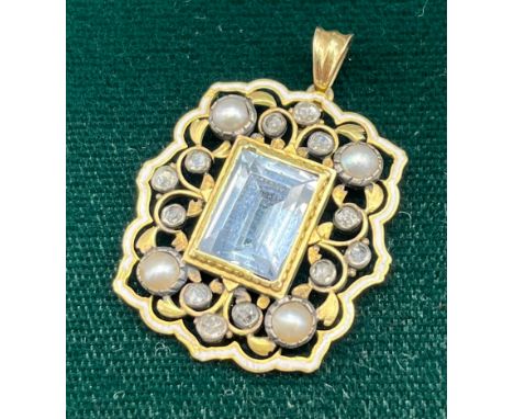 Antique 18ct yellow gold pendant, Ornate form, fitted with an emerald cut large aquamarine gem stone, surrounded by diamonds 