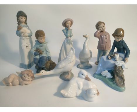 A Large collection of Nao figurines; A girl attending the rabbits figure &amp; other figures 