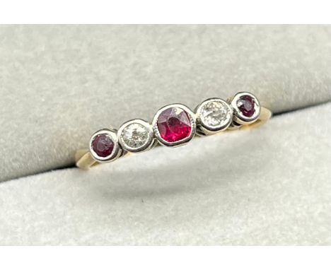 18ct gold &amp; Platinum, diamond and ruby ring. [Ring size J] [1.82Grams] 