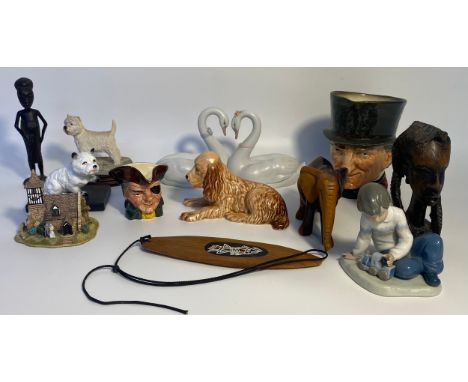 A selection of collectables; A Lladro his and her swan figure &amp; John Peel Royal doulton Toby jug 
