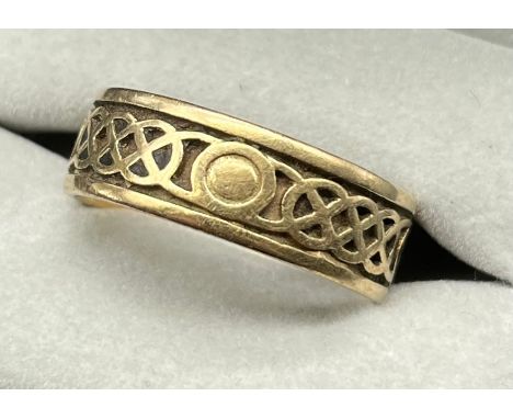 9ct yellow gold Celtic Design wedding band. [Ring size X,Y] [5.55Grams] 