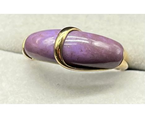9ct yellow gold and purple stone ring. [Ring size R] [3.46Grams] 