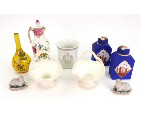 A pair of Royal Worcester white glazed sweetmeat baskets, model no. 1080, retailed by Phillips & Pearce, 11cm diameter, a pai