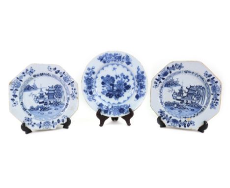 A Dublin Delftware blue and white plate, circa 1760, painted with a central basket of flowers inside a border scattered with 