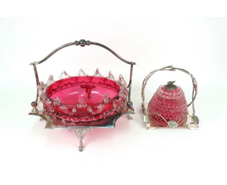 A cranberry glass bowl, with crimped border and sides, 23.5cm diameter and a cranberry glass honey jar, with bands of crimpin