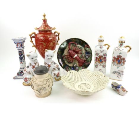 A pair of Alako Madrid Spanish porcelain square decanters, labelled 'Whisky' & 'Cognac', painted in Samson style with armoria