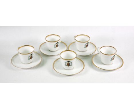 Five French porcelain coffee cups and saucers, 20th century, each cup painted with a cardinal's arms beneath a gilt line rim,
