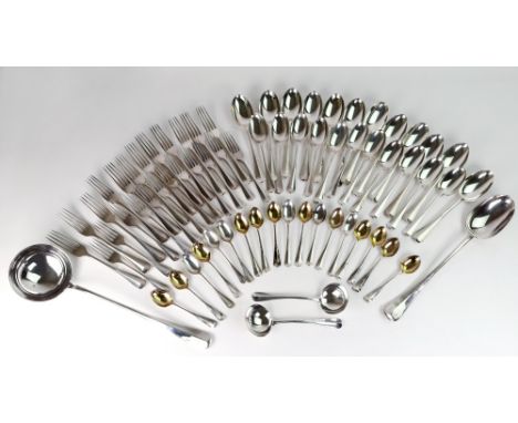 An oak cased Hanoverian rat-tail pattern silver canteen Daniel & John Wellby, London dates ranging from 1930 - 1938, 12 table