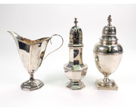 A Victorian silver baluster castor, London 1891, with threaded borders, pierced cover with wrythen finial, on a square base, 
