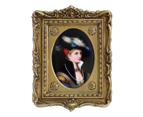 A German porcelain oval plaque, late 19th century, painted with a head and shoulders portrait of a young woman wearing a plum