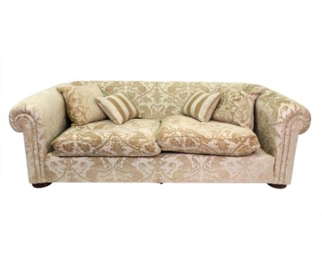 A Duresta Maximus three-seater sofa, upholstered in Duresta Pageantry Rolled Gold fabric, 244cm wide, 110cm deep, with duck f