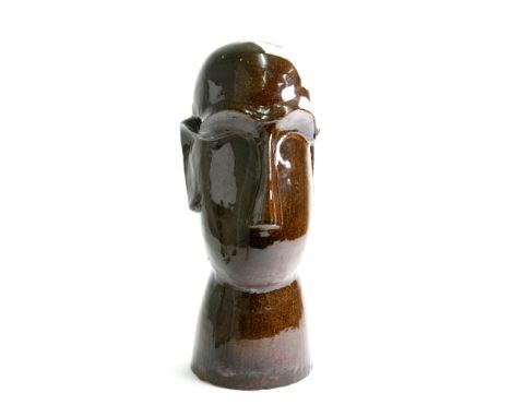 A contemporary brown glazed stoneware head, 43cm high, and a pair of crackle glaze ceramic masks by Evelyn Robbins, 1992 Stra