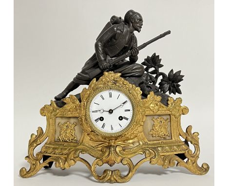 A nineteenth century French spelter and gilt cast metal clock, the white enamel dial with Roman numeral indices, and with Ori