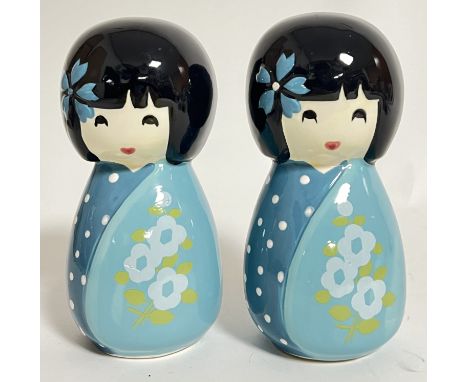 A pair of Japanese brightly glazed ceramic money boxes in the form of traditional wooden Kokeshi dolls (h- 16cm)