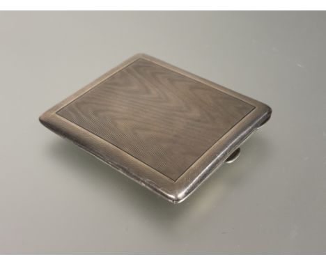 A Birmingham silver engine turned decorated cigarette case with engraved internal initials A.G: l. x 9.5cm Birmingham 1923 13