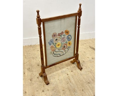 An Edwardian pine firescreen with sewn work panel (h.89cm)