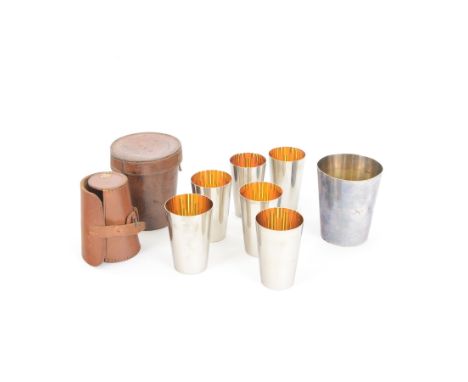 Asprey silver plated stirrup cup, engraved with name to body, together with a set of graduating silver plated stirrup cups, b