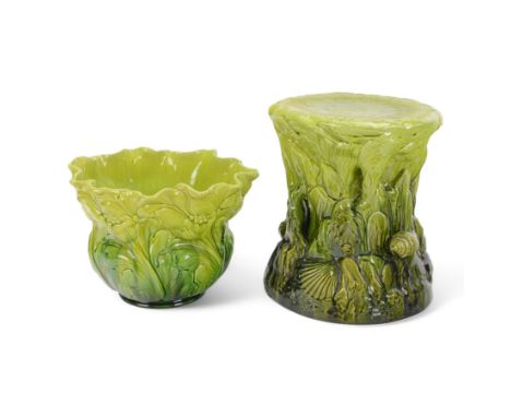 Bretby jardinière with fluted rim and moulded floral decoration, together witha Bretby plant stand, decorated in relief with 