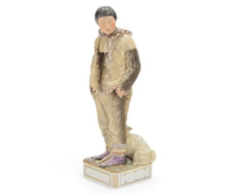 Royal Copenhagen Greenlandic figures, Man with Sledge dog by Carl Martin-Hansen, no.12225, with printed mark beneath, H32cm