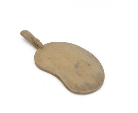 Mouseman - oak kidney-shaped cheeseboard, the handle caved with mouse signature, by the workshop of Robert Thompson, Kilburn,