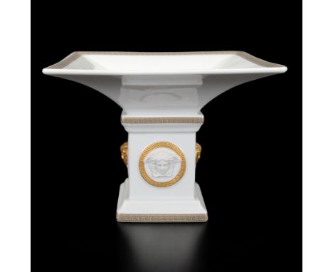 Rosenthal Versace Gorgona pedestal dish, of square form, decorated in relief with Medusa masks and with gilt Greek key border