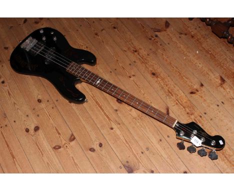 Jack Daniels electric bass guitar.