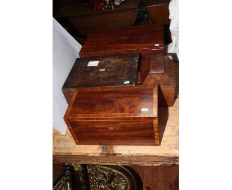 Four antique boxes including crossbanded mahogany caddy.
