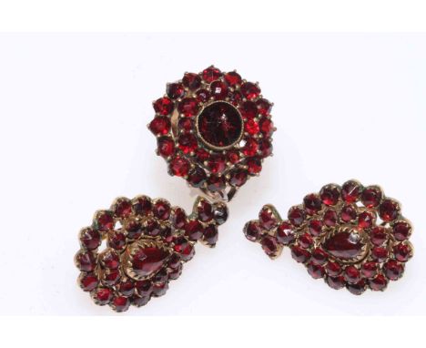 Garnet set ring and pair earrings.