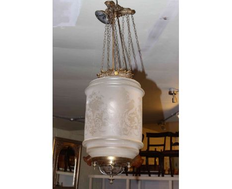 A good Victorian brass centre ceiling light, the cylindrical etched glass shade decorated with cherubs, flora and forna, appr