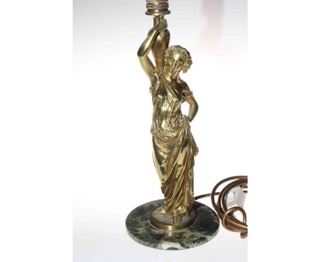 Victorian gilt brass maiden water carrier converted to table lamp, 33cm to lamp holder.