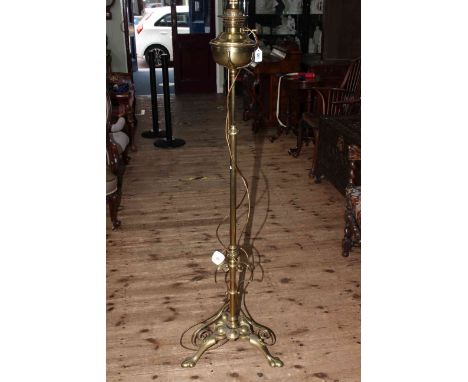Edwardian brass telescopic standard oil lamp, converted to electric, with shade.