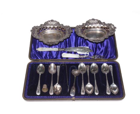 Part boxed set of silver teaspoons and tongs, silver and mother of pearl knife and fork, salt spoon and thimble, bon bon dish