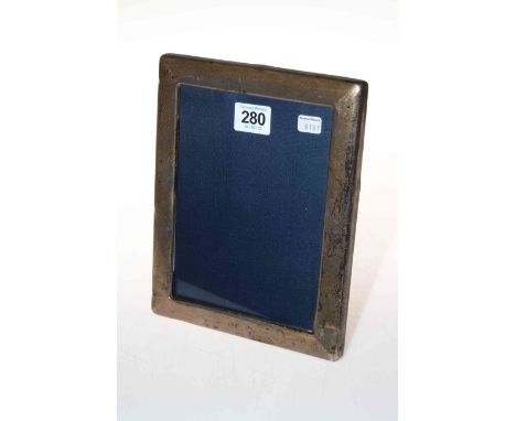 Silver mounted easel photograph frame, 22cm by 17cm.