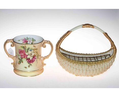 Royal Worcester blush two handled loving cup and moulded basket (2).