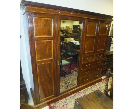 A late 19th / early 20th Century mahogany and satinwood inlaid wardrobe compactum