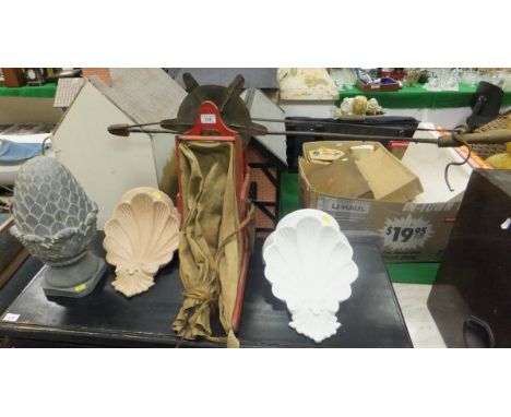 A vintage painted seed fiddle, two terracotta wall brackets and a terracotta finial
