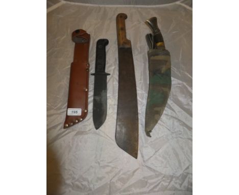 A kukri with camouflage cover, a World War I machete, the blade stamped "Bret Acier Fondu 1915" and a further cased military 