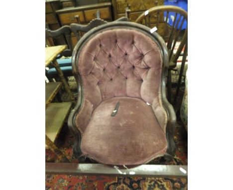 A Victorian button back upholstered salon elbow chair