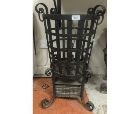 A vintage wrought iron brazier