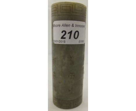 A Chinese carved jade cylindrical scroll holder engraved with character marks within Greek key borders CONDITION REPORTS Gene
