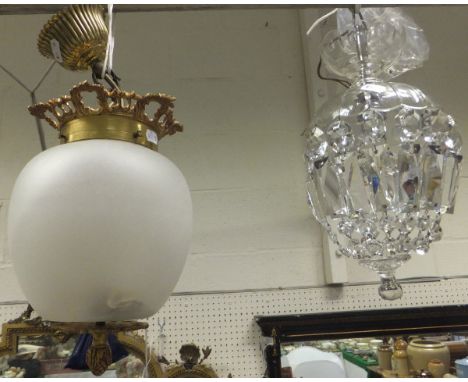 A modern brass mounted and frosted glass ceiling light fitting, together with a brass pendant ceiling light fitting