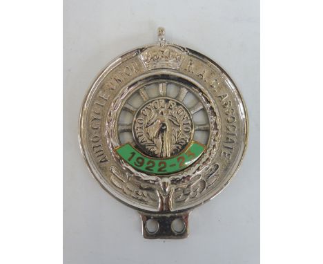 An Auto-Cycle Union R.A.C. Associate badge with enamel date of 1922-23, stamped 77754.