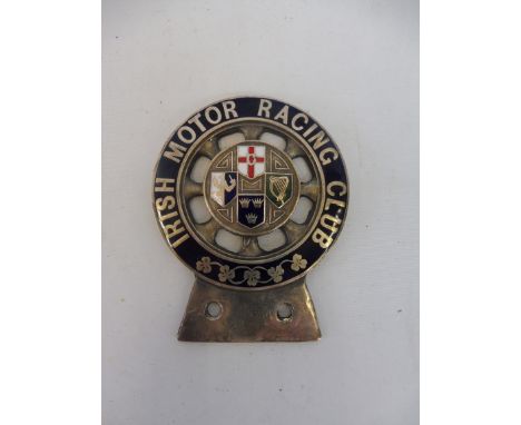 A rare Irish Motor Racing Club car badge, nickel plated and enamel in very good condition, stamped '84' to the verso.