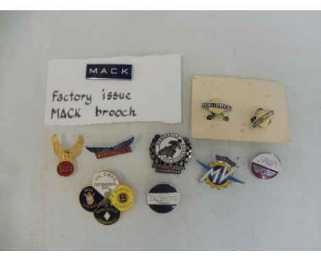 A selection of enamel lapel badges including Morris Commercial, Mack, Triumph, Jawa etc.