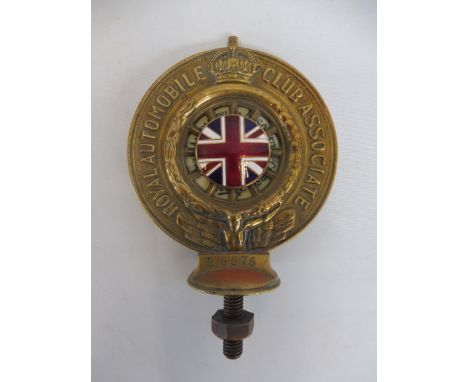 A Royal Automobile Club Associate car badge, polished brass with excellent enamel union jack centre, no. B5575, solid type wi
