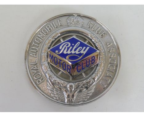 A Royal Automobile Club Associate car badge with unusual Riley Motor Club enamel centre.