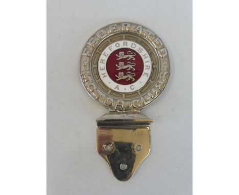 A rare Federated Motor Clubs type 1 car badge with Herefordshire A.C. enamel centre, made by Fattorini &amp; Sons Ltd, stampe