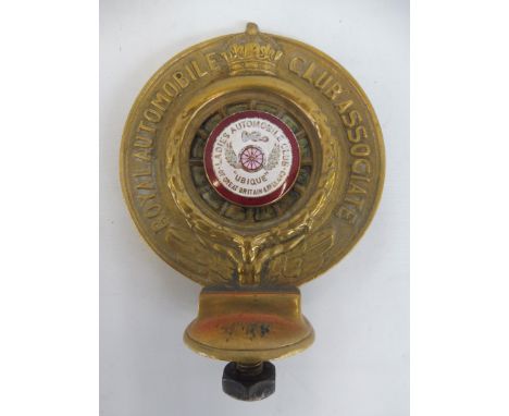 A Royal Automobile Associate car badge, polished brass, with Ladies Automobile Club of Great Britain &amp; Ireland red and wh